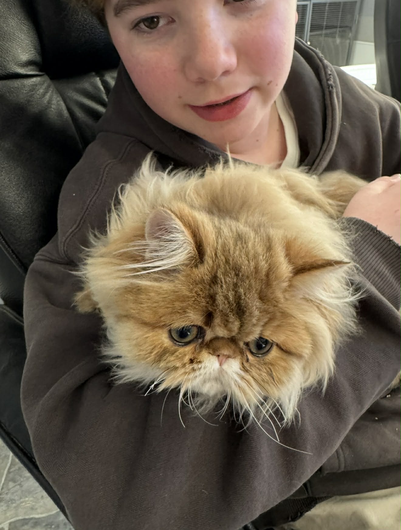 Fisher with Panda the cat from China